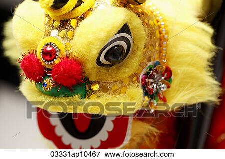 Picture of Yellow lion dance toy. Chinese New Year decoration