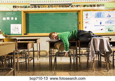 Stock Photo Of Boy Sleeping On Desks In Clroom Bcp710 13 Search Boy Sleeping On Desks In Clroom