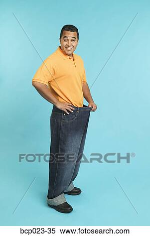Stock Image of Man wearing pants that are too large bcp023-35 - Search