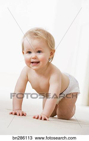 Stock Photo of Baby crawling bn286113 - Search Stock Images, Poster