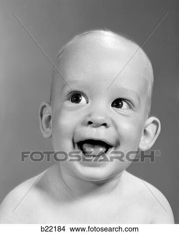 Smiling Bald Looking To The Side Stock Photo Of 1960s Up Portrait Of Nearly Bald Baby