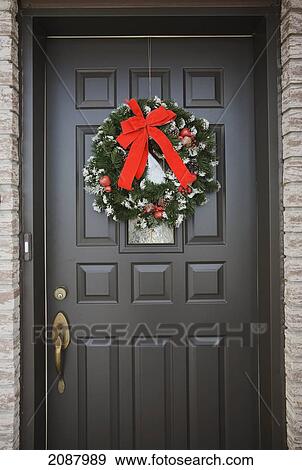 Christmas Front Door Clipart stock photograph of christmas wreath on the front door of a Christmas Front Door Clipart stock photograph of christmas wreath on the front door of a