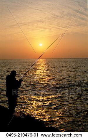 Banques de Photographies coucher soleil mer silhouette