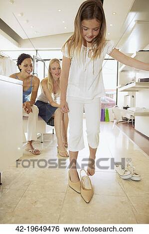Stock Images of Girl trying to walk in high heels 42 ...