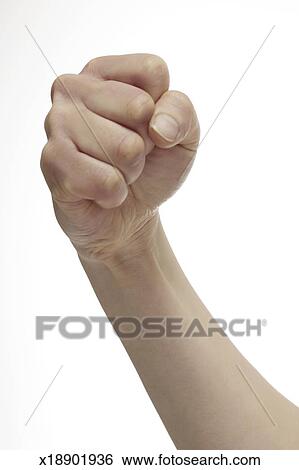 womans-arm-raised-with-clenched-fist-stock-images__x18901936.jpg