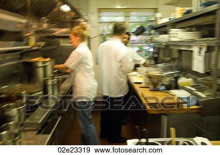 Restaurant Kitchen Photography stock photograph of team of restaurant kitchen staff busy at work Restaurant Kitchen Photography stock photograph of team of restaurant kitchen staff busy at work