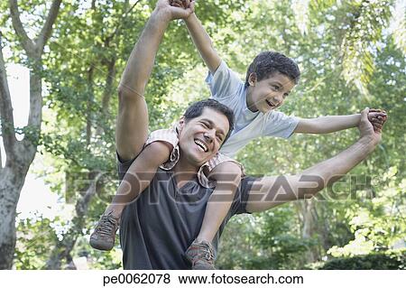 Shoulder Riding Pictures Boy Shoulder Ride Smiling