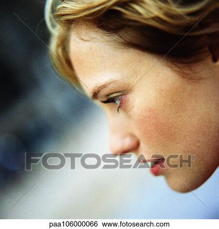 Stock Images of Young woman's face, side view, close-up paa106000066