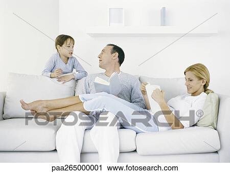 Stock Photography Of Pas Sitting On Sofa Standing Behind Stock Photography Pas Sitting On Sofa Standing Behind Talking To Father
