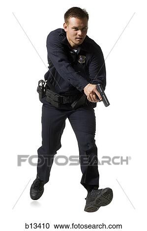cop pointing gun dwon stock photo