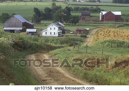 Ohio, Holmes County, amish, farm, A Amish farm with a red barn down a ...