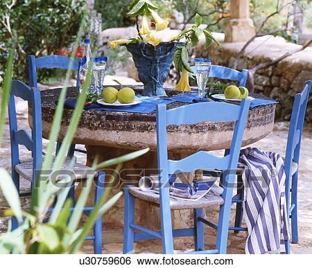 Stock Images Of Rustic Style Table With Blue Chairs U30759606 Stock Images Of Rustic Style Table With Blue Chairs U30759606