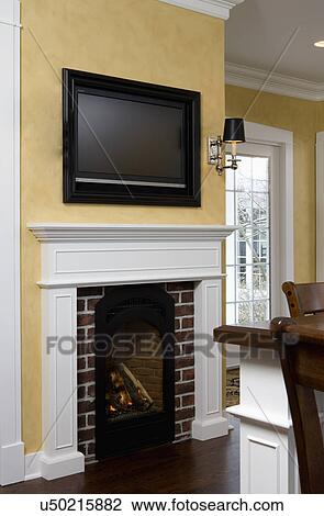 FIREPLACES close up of bed and breakfast gas fireplace in kitchen