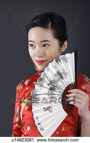 http://fscomps.fotosearch.com/compc/UNB/UNB127/young-woman-wearing-traditional-chinese-stock-photography__u14823081.jpg