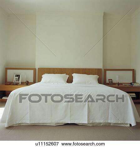 Immagine semplice, bianco, copriletto, e, cuscini, su, luce ...