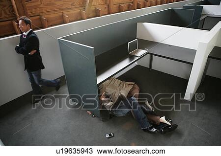 bussiness men showing someone inside the office