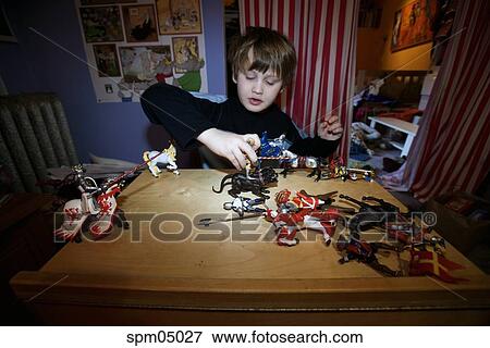 playing with action figures