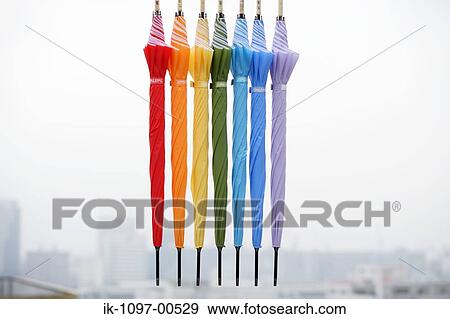 7 closed umbrellas View Large Photo Image Stock Photo - 7 closed umbrellas. Fotosearch