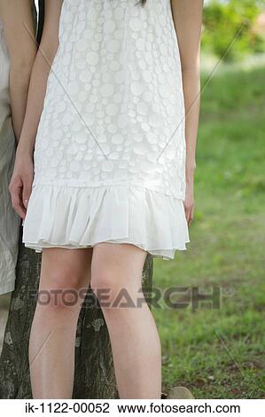 Stock Image - A woman in casual attire. Fotosearch