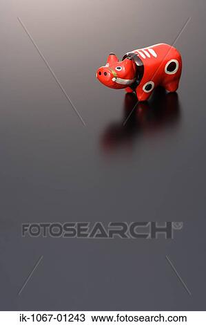 'Akabeko' cow figurine View Large Photo Image Stock Image - 'Akabeko' cow figurine. Fotosearch