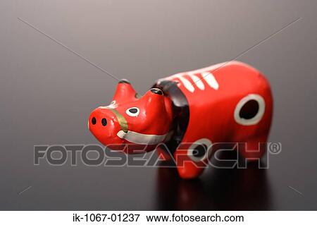 'Akabeko' cow figurine View Large Photo Image Stock Photo - 'Akabeko' cow figurine. Fotosearch