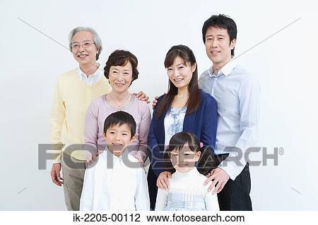 Asian family standing together View Large Photo Image Stock Image - Asian family standing together. Fotosearch