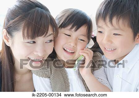 Picture - Asian mother and her children. Fotosearch