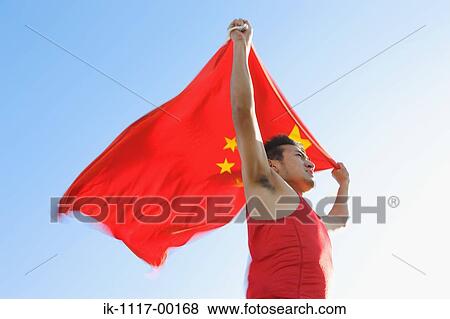 Stock Photo - Athlete Holding China's Flag. Fotosearch