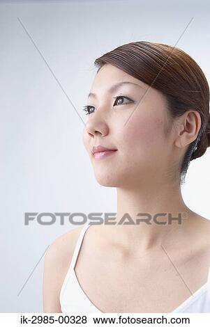 Stock Photo - Beautiful Japanese Woman Looking Away . Fotosearch
