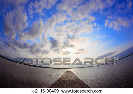 Beautiful view of sea with horizon and cloudy sky View Large Photo Image Stock Photo - Beautiful view of sea with horizon and cloudy sky . Fotosearch