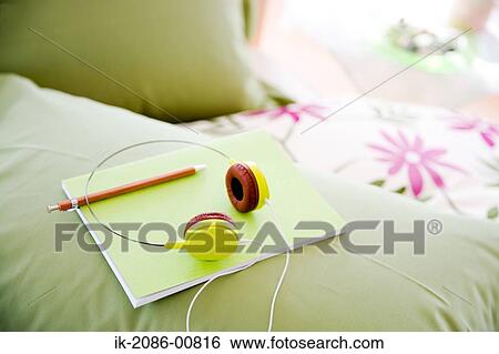 Bedroom with Bed, Pencil and Headphone View Large Photo Image Stock Photograph - Bedroom with Bed, Pencil and Headphone . Fotosearch