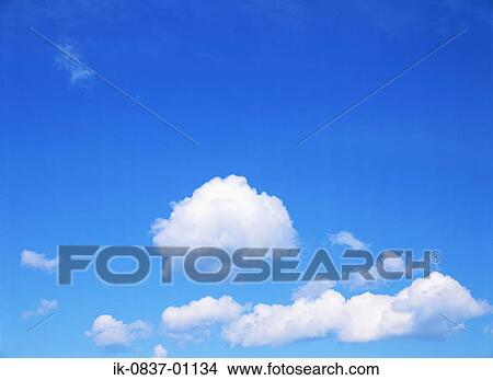Blue sky with fluffy clouds View Large Photo Image Picture - Blue sky with fluffy clouds. Fotosearch