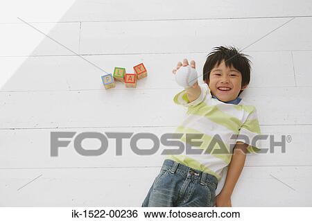 Boy Holding Baseball View Large Photo Image Stock Photograph - Boy Holding Baseball. Fotosearch