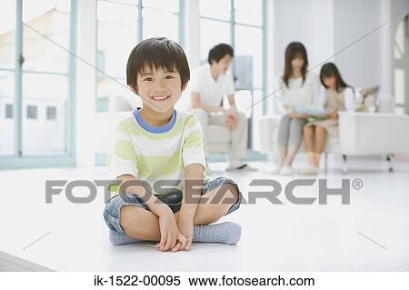 Boy Sitting Down View Large Photo Image Stock Photography - Boy Sitting Down. Fotosearch
