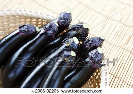 Brinjals in straw basket View Large Photo Image Stock Photography - Brinjals in straw basket. Fotosearch