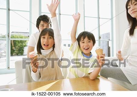 Brother and Sister Enjoying Ice Cream Cones View Large Photo Image Stock Photography - Brother and Sister Enjoying Ice Cream Cones. Fotosearch