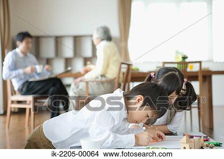 Brother and sister painting in dining room View Large Photo Image Picture - Brother and sister painting in dining room. Fotosearch