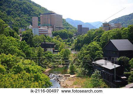 Buildings surrounded with trees on hillside View Large Photo Image Stock Photo - Buildings surrounded with trees on hillside. Fotosearch