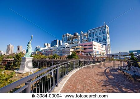 Buildings with pedestrian bridge and statue View Large Photo Image Picture - Buildings with pedestrian bridge and statue. Fotosearch