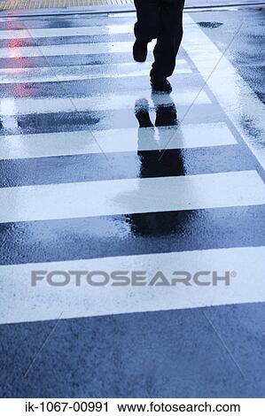 Stock Image - Businessman Legs Running. Fotosearch