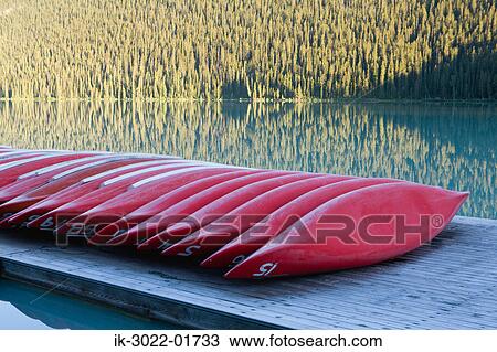Canoe on Lake Louise in Banff, Alberta, Canada View Large Photo Image Stock Image - Canoe on Lake Louise in Banff, Alberta, Canada. Fotosearch
