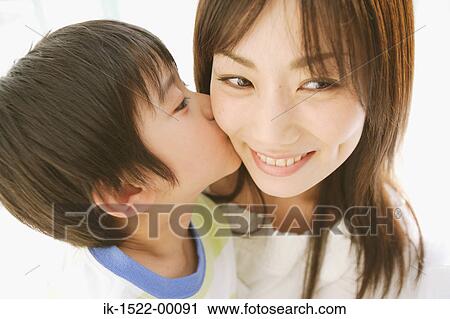 Child Kissing Mother View Large Photo Image Stock Image - Child Kissing Mother. Fotosearch
