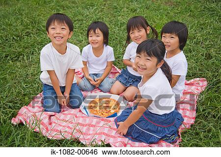 Children eating pizza View Large Photo Image Stock Photograph - Children eating pizza. Fotosearch