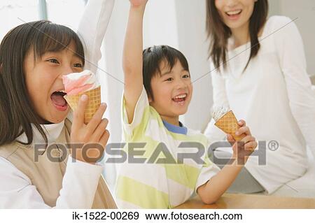 Stock Photo - Children Having Ice Cream. Fotosearch