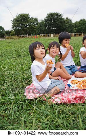 Children Having Pizza in Park View Large Photo Image Stock Image - Children Having Pizza in Park. Fotosearch