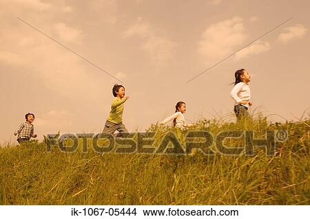 Children running in park together View Large Photo Image Picture - Children running in park together. Fotosearch