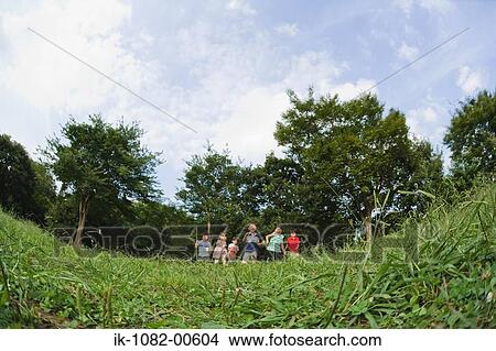 Children running in park together View Large Photo Image Picture - Children running in park together. Fotosearch