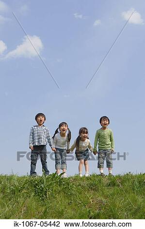 Children standing in a row and yelling together View Large Photo Image Stock Image - Children standing in a row and yelling together. Fotosearch