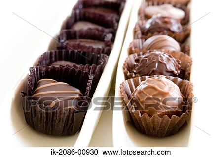 Stock Image - Chocolate Truffle in Cupcakes. Fotosearch