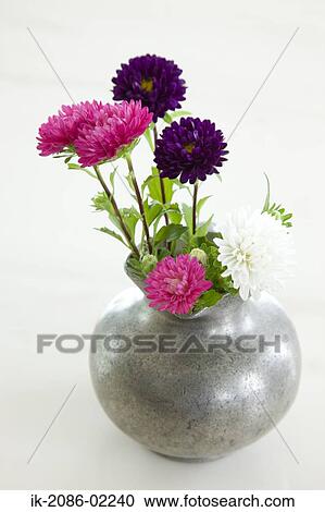 Stock Image - Colourful flowers in a vase. Fotosearch